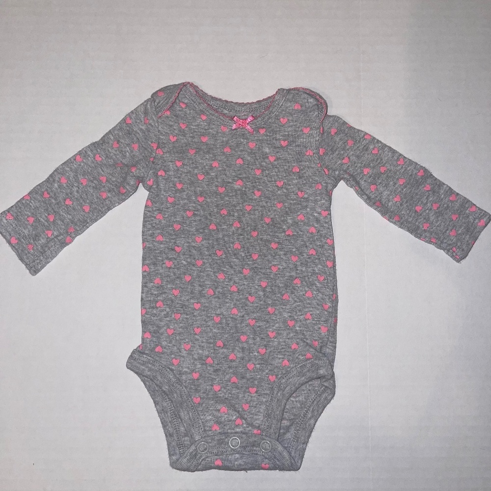 Carter’s - newborn onesie with pink heart